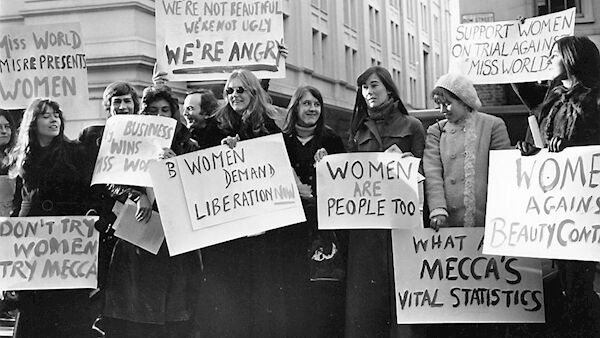 An eventful evening, Sally Alexander, one of the protesters, was carried from the building by her arms and legs. Picture: Getty An eventful evening, Sally Alexander, one of the protesters, was carried from the building by her arms and legs. Picture: Getty