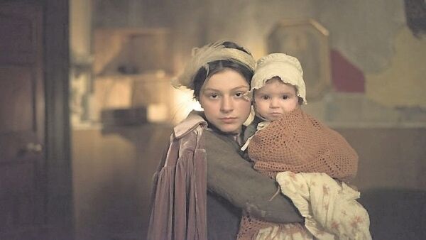 Rebellion's Jordanne Jones as Minnie Mahon with baby Mahon