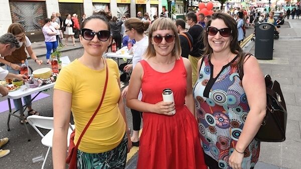 Attending the street party are Marija Nuic, Marta Kolasa, and Laura O'Connell.