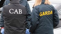 CAB seize designer watches, jewellery and clothing in Waterford