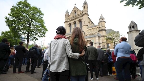 Mourners listen to the funeral service of murdered journalist Lyra McKee outside St Anne's Cathedral in Belfast. (Liam McBurney/PA Wire)