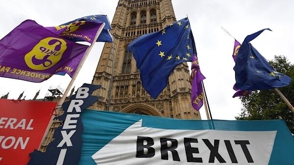 Flags outside the Houses of Parliament in London today.