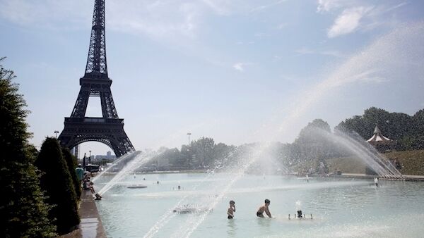 Children cool off in the fountain of the Trocadero, in Paris, Tuesday, June 25, 2019. (AP Photo/Thibault Camus)