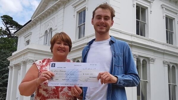 Irish Examiner Editorial Manager, Diane McDermott, presents Emil with his winner's cheque at UL this afternoon Irish Examiner Editorial Manager, Diane McDermott, presents Emil with his winner's cheque at UL this afternoon