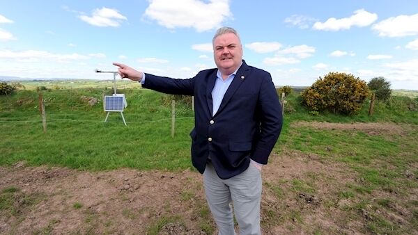 IS THIS THE WAY FOR AMARENCO: John Mullins of solar energy firm Amarenco beside a solar test rig on the land at Inniscarra where solar panels will be located. Picture: Gavin Browne
