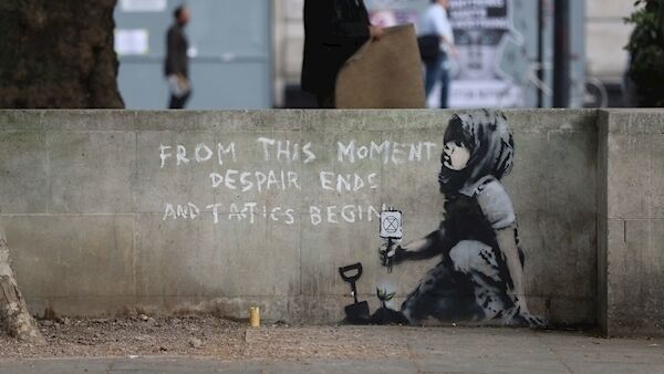 An artwork which appears to be by street artist Banksy has appeared near the former location of the Extinction Rebellion camp in Marble Arch, London. (Jonathan Brady/PA Wire)