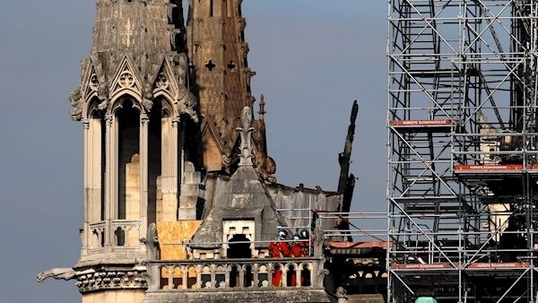 Firefighters atop the 12th century Notre Dame cathedral. Picture: AP /Francois Mori