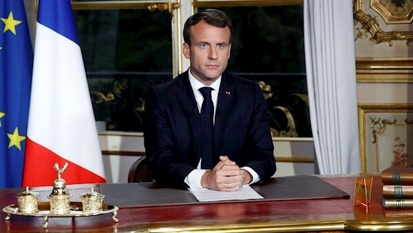 French president, Emmanuel Macron, addressing the nation. He wants the cathedral restored in five years. Picture: Yoan Valat, via AP