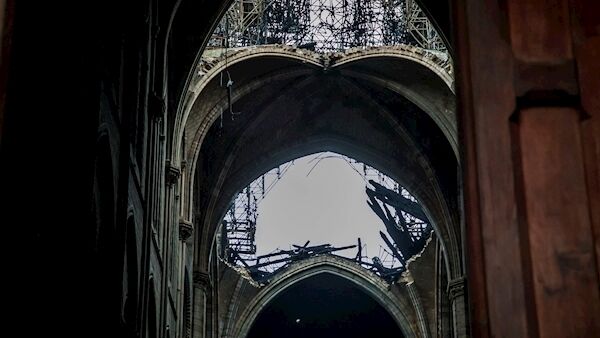 A hole in the dome inside Notre Dame cathedral in Paris. Picture: Christophe Petit Tesson, Pool via AP