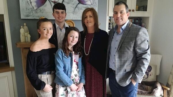 John (far right) with his children Lauren (15) Ronan (18) Maeve (12) and his wife Deirdre with John Wall.
