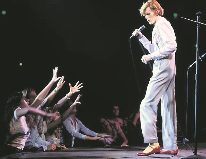 David Bowie in concert during his Diamond Dog tour in Los Angeles, circa 1974. Picture: Terry O'Neill
