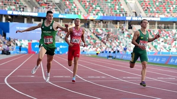 Stephen Gaffney of Ireland, left, finishes second in the Men's 100m during Dynamic New Athletics qualification on Day 3. Pic: Sportsfile