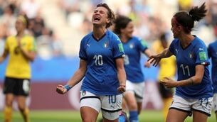 Italy put five past Jamaica to move into last 16