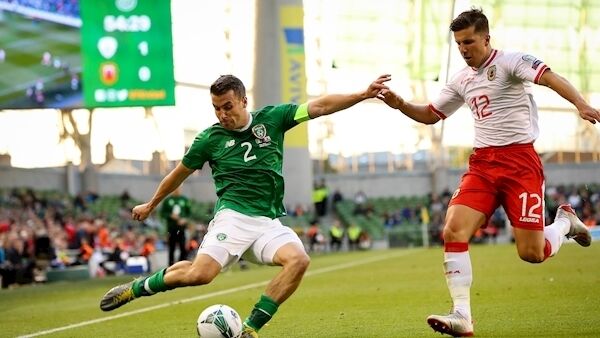 Ireland's Seamus Coleman and Jayce Olivero of Gibraltar. Photo Credit: ©INPHO/Ryan Byrne.