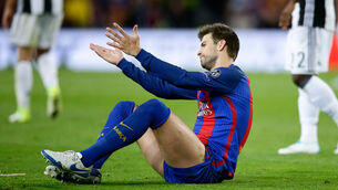 Barca defender Pique simply minding his own business