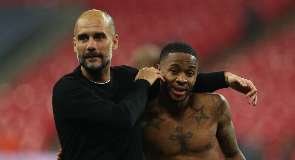 Sterling with Man City boss Pep Guardiola