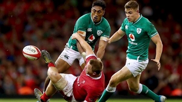 Ireland’s Bundee Aki and Garry Ringrose tackle James Davies of Wales. Photo: INPHO/James Crombie Ireland’s Bundee Aki and Garry Ringrose tackle James Davies of Wales. Photo: INPHO/James Crombie