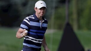 McIlroy in contention as Woods struggles in first FedEx Cup play-off event