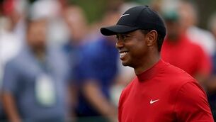 Knee op rules Tiger Woods out until October