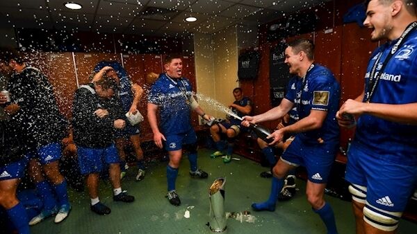 Tadhg Furlong, left, and Jonathan Sexton of Leinster celebrate in the locker room. Picture: Ramsey Cardy/Sportsfile