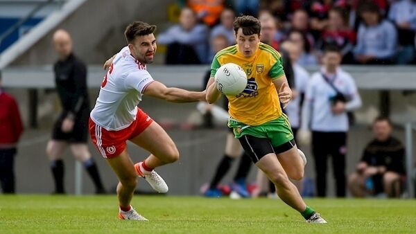 Eoin McHugh of Donegal in action against Tiernan McCann of Tyrone during the Ulster GAA Football Senior Championship semi-final match between Donegal and Tyrone at Kingspan Breffni Park in Cavan. Photo: Daire Brennan/Sportsfile.