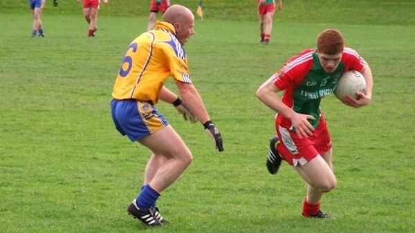 Tyrone's Cathal McShane in action with Owen Roes in Div 3 of the Tyrone ACL against Killyman..