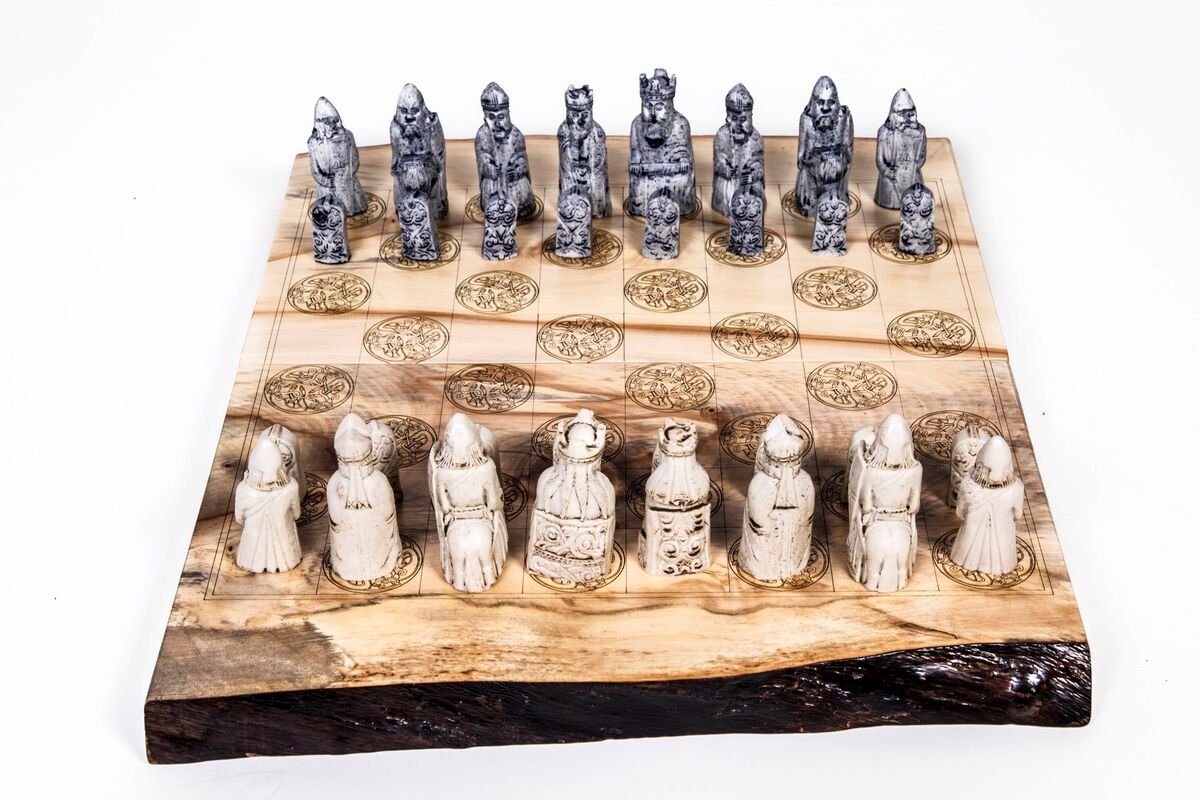 The Native Collection chessboard with limestone pieces.