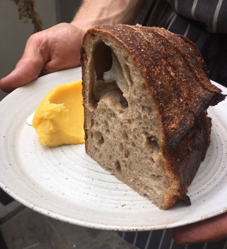Dark crusty loaves of natural sour dough are baked in the ‘state of the art’ bakery in the barn and served with homemade Guernsey butter. Picture: Charlie McKay Dark crusty loaves of natural sour dough are baked in the ‘state of the art’ bakery in the barn and served with homemade Guernsey butter. Picture: Charlie McKay