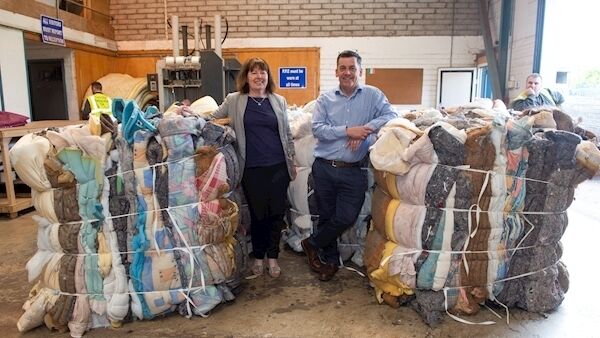 Bernadette Connolly, Cork Environmental Forum and Paul Kelly, project manager, Boomerang Enterprises standing among the recycled mattresses to by recycled at Boomerant Enterprises, Ballyvolane, Cork. Picture Dan Linehan