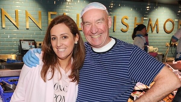 Sarah chatting with fishmonger Pat O’Connell who got into the spirit of the experiment by changing into a pair of PJs himself.