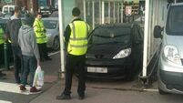 Desperate shopper parks in supermarket trolley bay
