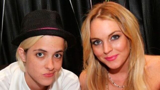 Lohan accuses Ronson of spitting in her face