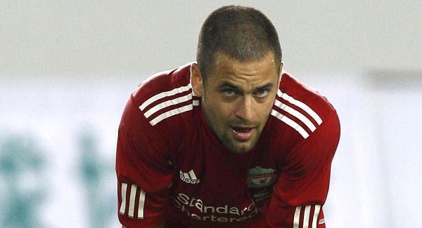 Liverpool midfielder Cole shown Anfield door