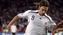 German midfielder Frings calls it quits