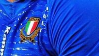 Italy overcome dogged Tonga