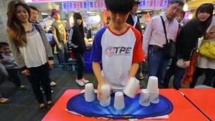 Ninja cup stackers hit the streets of Taipei