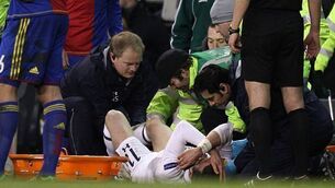 Bale injury  tops  night of frustration for Tottenham 