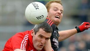 Cork charmed as Sheehan steals points from devastated Down 