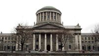'Gambling addict' solicitor surrenders passport