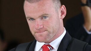 Moyes tetchy as Rooney goes home 