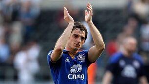 United in battle for Baines