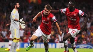 Gunners cruise but injuries worry Wenger