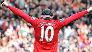 Rooney back with a bang