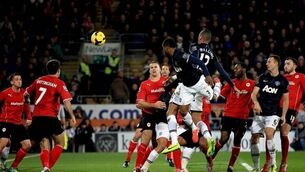 Cardiff in the pink despite Rooney escaping red