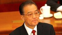 Chinese Premier plays down trade rift with US