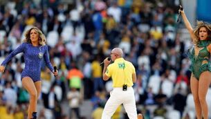World Cup kicks off as police tackle demonstrators 
