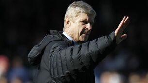Title race is wide open, insists Wenger