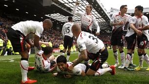 Rodgers refuses to dream just yet