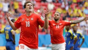Seferovic swoops in injury-time for Swiss