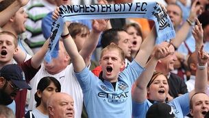 Champions paint town blue
